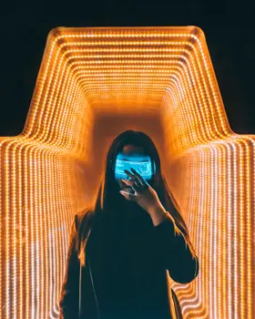 Silhouetted figure with digital projected visor