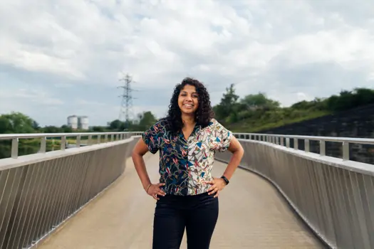 Milly Hennayake, female civil engineer, smiles at camera