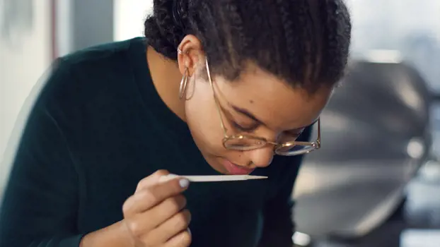 Chemical engineer sampling fragrances