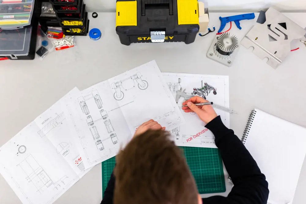 Mechanical engineer looking at design plans