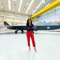 Sophie Harker: Female aerospace engineer in aircraft hangar with plane