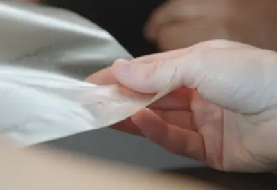 Engineer examining biodegradable plastic alternative