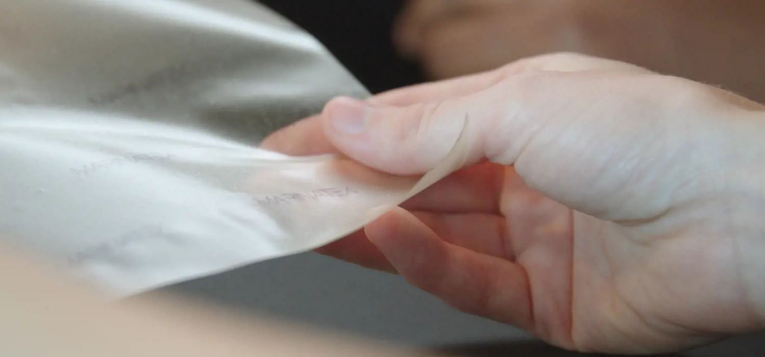 Engineer examining biodegradable plastic alternative