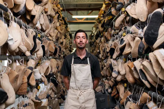 Alan Proud, orthotic technician standing with foot moulds