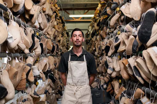 Alan Proud, orthotic technician standing with foot moulds