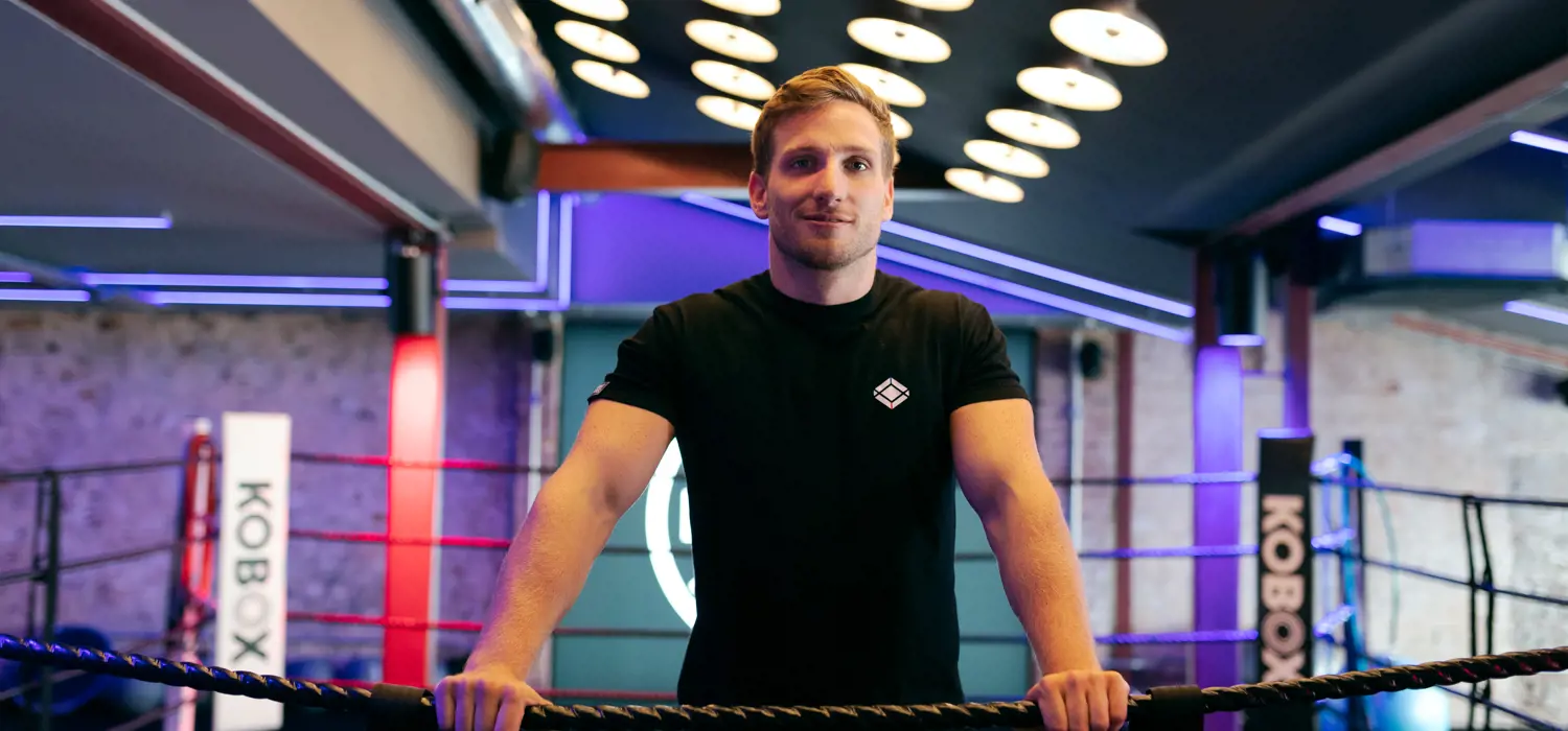 Male mechanical engineer in boxing ring